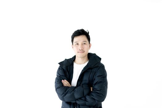 Handsome asian man dressed with winter clothing, isolated on white background