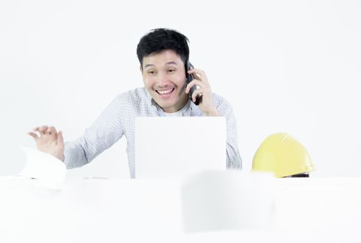 Asian employee engineer salary man sitting at desk throwing papers with feeling angry and upset, isolated on white background.