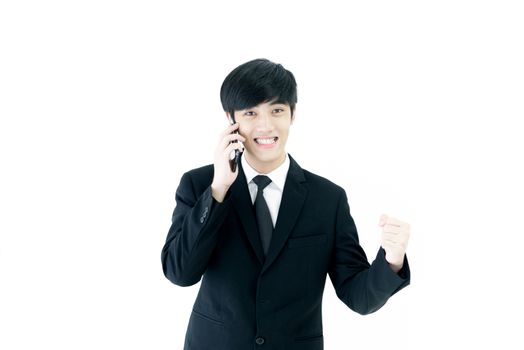 Asia businessman with black suit and black necktie has feeling victory isolated on white background.