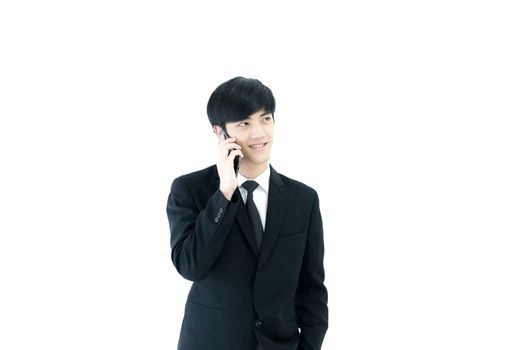 Asia businessman with black suit and black necktie has talking by  phone isolated on white background.