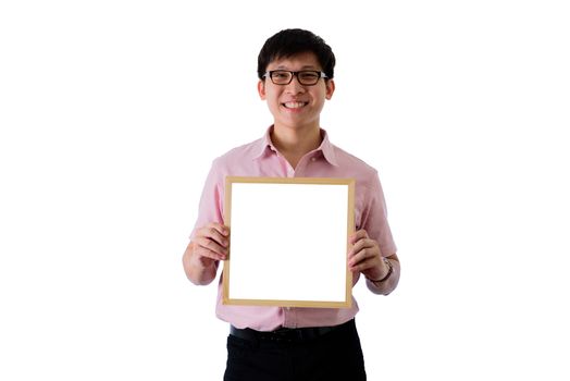 Asian young businessman has standing and holding the blank white screen board with happy on isolated on wihte background.