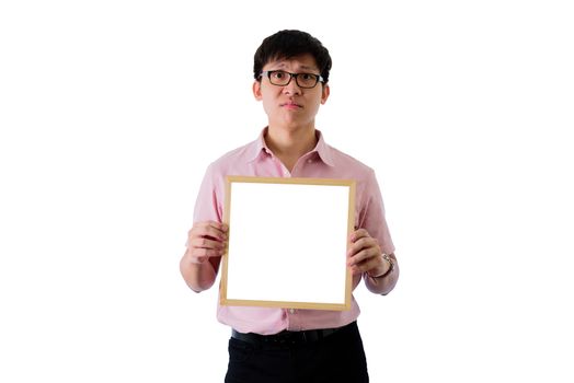 Asian young businessman has standing and holding the blank white screen board with unhappy on isolated on wihte background.