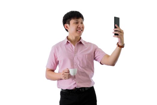 Asian young businessman has standing and working with a cup of coffee on isolated on wihte background.