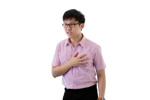 Asian young businessman has standing with chest pain on isolated on wihte background.