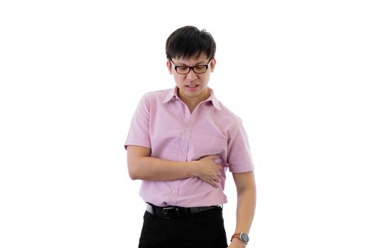 Asian young businessman has standing with stomachache on isolated on wihte background.