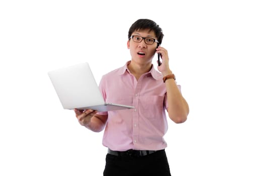 Asian young businessman has standing and  holding phone and laptop for working with busy on isolated on wihte background.