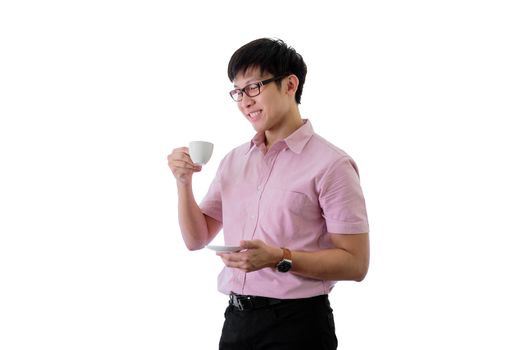 Asian young businessman has standing and drinking a cup of coffee with happy on isolated on wihte background.