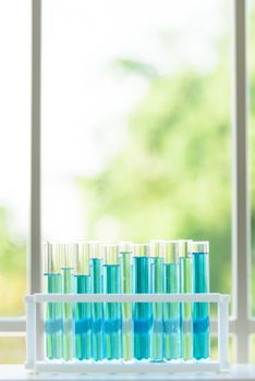 Set of laboratory glassware with colorful in test lab room.