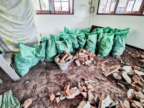 Room and interior and red brick destroyed in the room.