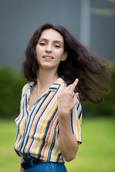 Portrait of a beautiful woman smiling in the garden.