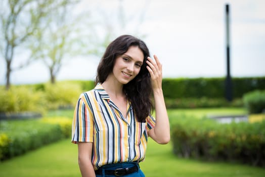 Portrait of a beautiful woman smiling in the garden.