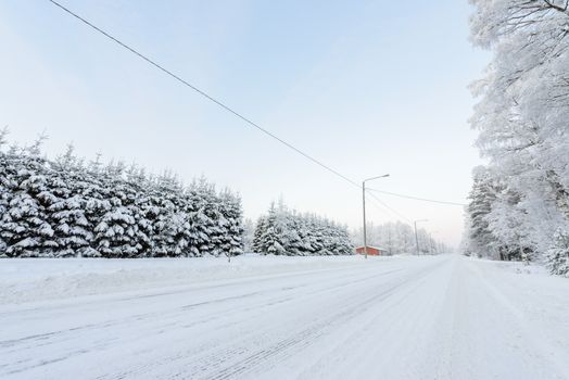 The road number 496  has covered with heavy snow in winter season at Lapland, Finland.
