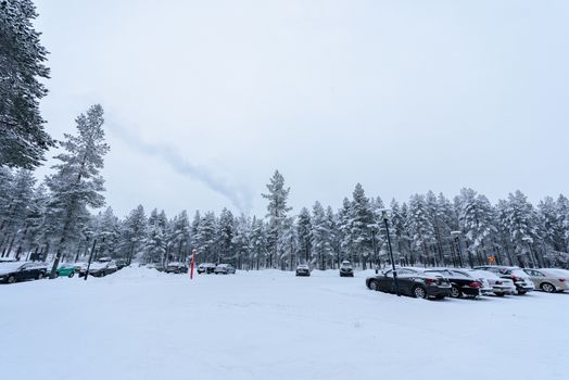 Editorial: Kuusamon City, Finland, 27th December 2018. Car park at Holiday Club Kuusamon Tropiikki with heavy snow in winter season at Kuusamon, Finland.