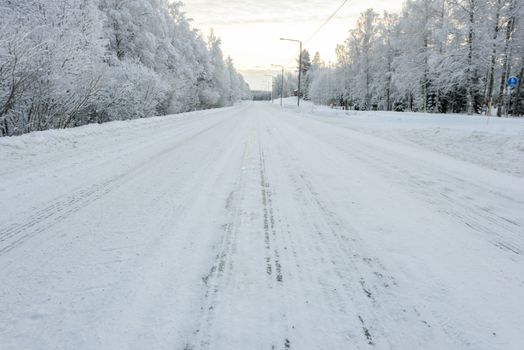 The road number 496  has covered with heavy snow in winter season at Lapland, Finland.