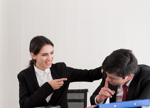 A businesswoman has upset with to sleep of the workmate in the working time at the office.