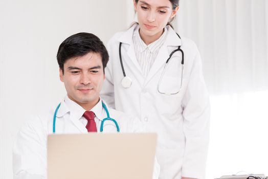 Two doctors have working together with happiness in the hospital.