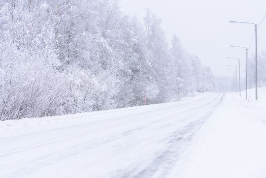 The road number 496  has covered with heavy snow in winter season at Lapland, Finland.