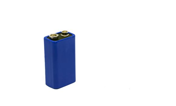 a blue 9 volt battery isolated on a white background. Power supply. Copy space. Environmental pollution