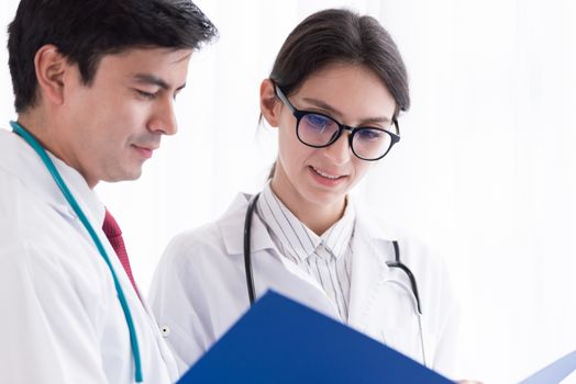 Two doctors have working together with happiness in the hospital.