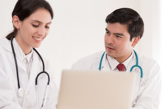 Two doctors have working together with happiness in the hospital.