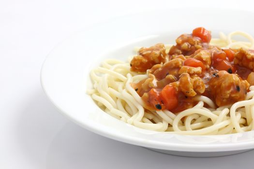 spaghetti with tomato sauce isolated in white background