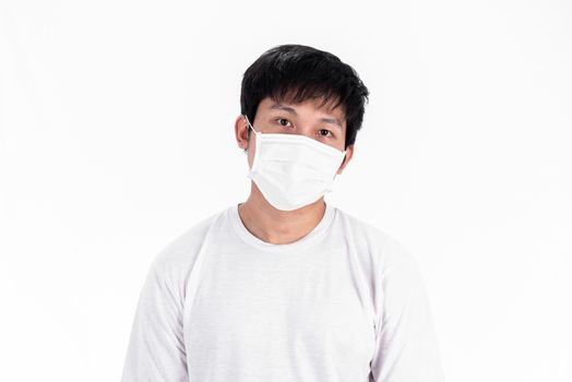 Asian young man in white shirt and medical mask to protect COVID-19 with isolated on white background concept.