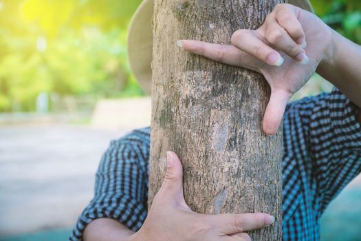 Rural women hand in picture frames to show their liking for photographing trees