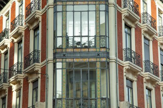 Oviedo, Spain - 10 December 2018: Architecture of calle ancha 8 and Chocolateria Valor