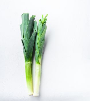 Green leek sultan onion on white table, top view