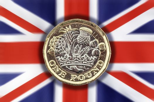 New one pound coin of England UK introduced in 2017 which show emblems of each of the nations cut out and isolated on a Union Jack background