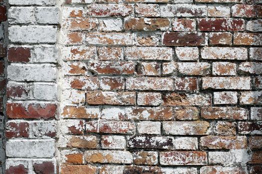 Old large red brick wall texture background distressed with white paint