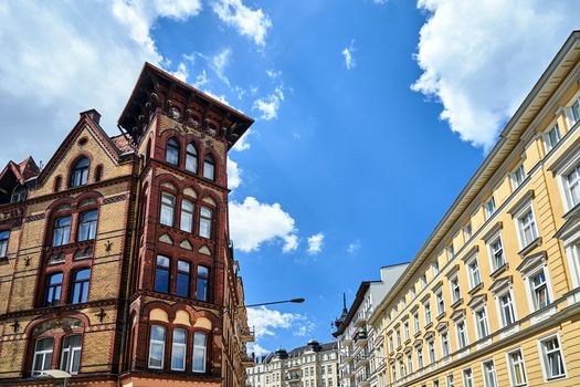 A street with historic, Art Nouveau tenement houses in the city of Poznan