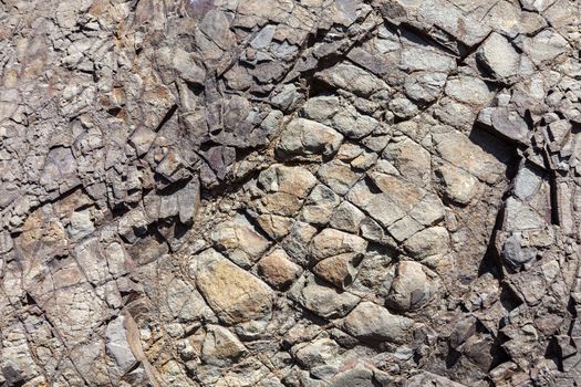 Volcanic weathered stone rock close up texture background