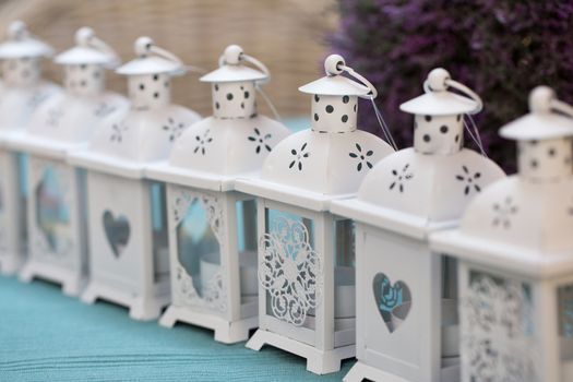 Row of white decorative retro lanterns