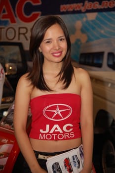 PASAY, PH - APR. 1: Jac motors female model at 8th Manila International Auto Show on April 1, 2012 in World Trade Center Metro Manila, Pasay, Philippines.