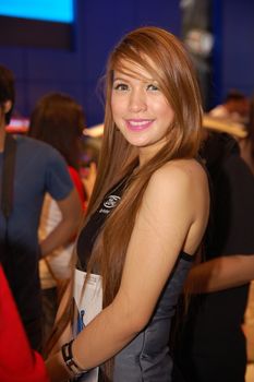 PASAY, PH - APR. 1: Ford female model at 8th Manila International Auto Show on April 1, 2012 in World Trade Center Metro Manila, Pasay, Philippines.