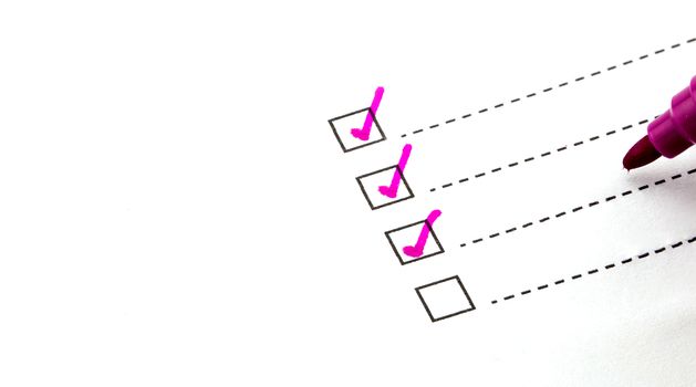 businessman preparing checklist at office desk.