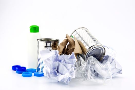 Heap of plastic garbage on white background.
