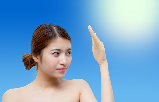 Beautiful woman face with sunshine, concept for skin care and sun block, beauty concept.