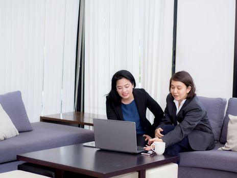 senior and junior businesswoman discuss something during their meeting.