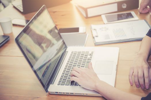 Closeup computer notebook in office with woman for work.