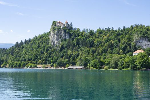 view of the lake with the castle in the background in Bled, Slovenia