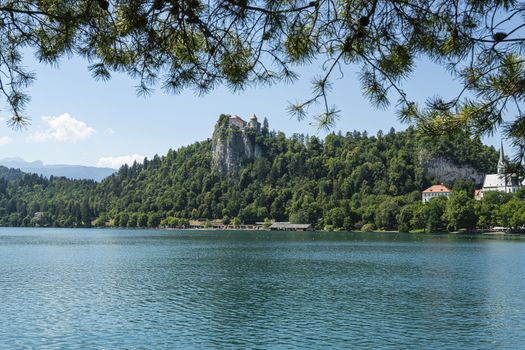 view of the lake with the castle in the background in Bled, Slovenia