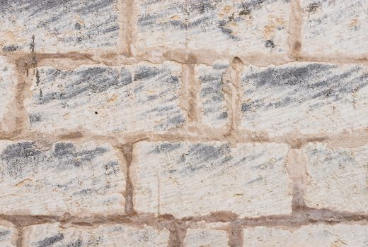 Vintage grey stone wall background texture with copy space