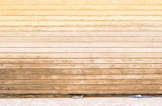 Old wooden rolling gate garage background texture