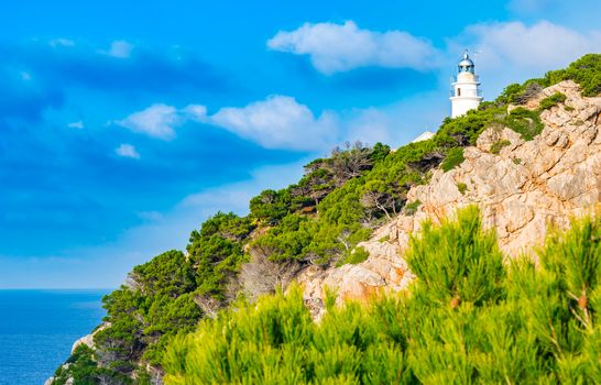 Beacon at the cliffs on Majorca island, cape at Cala Ratjada, Spain Mediterranean sea