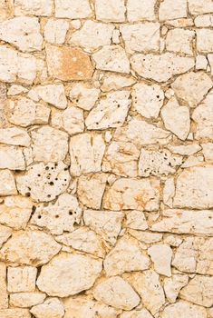 Rustic old stone wall texture background structure