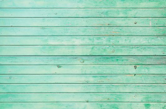 Teal painted wooden planks background texture with copy space