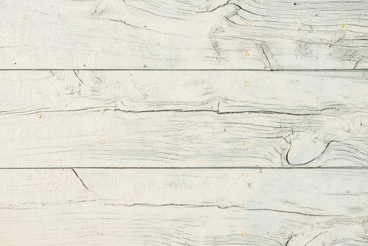 Light gray white wooden planks background texture close-up with copy space