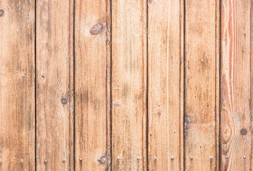 Rustic wooden wall planks background texture, close-up